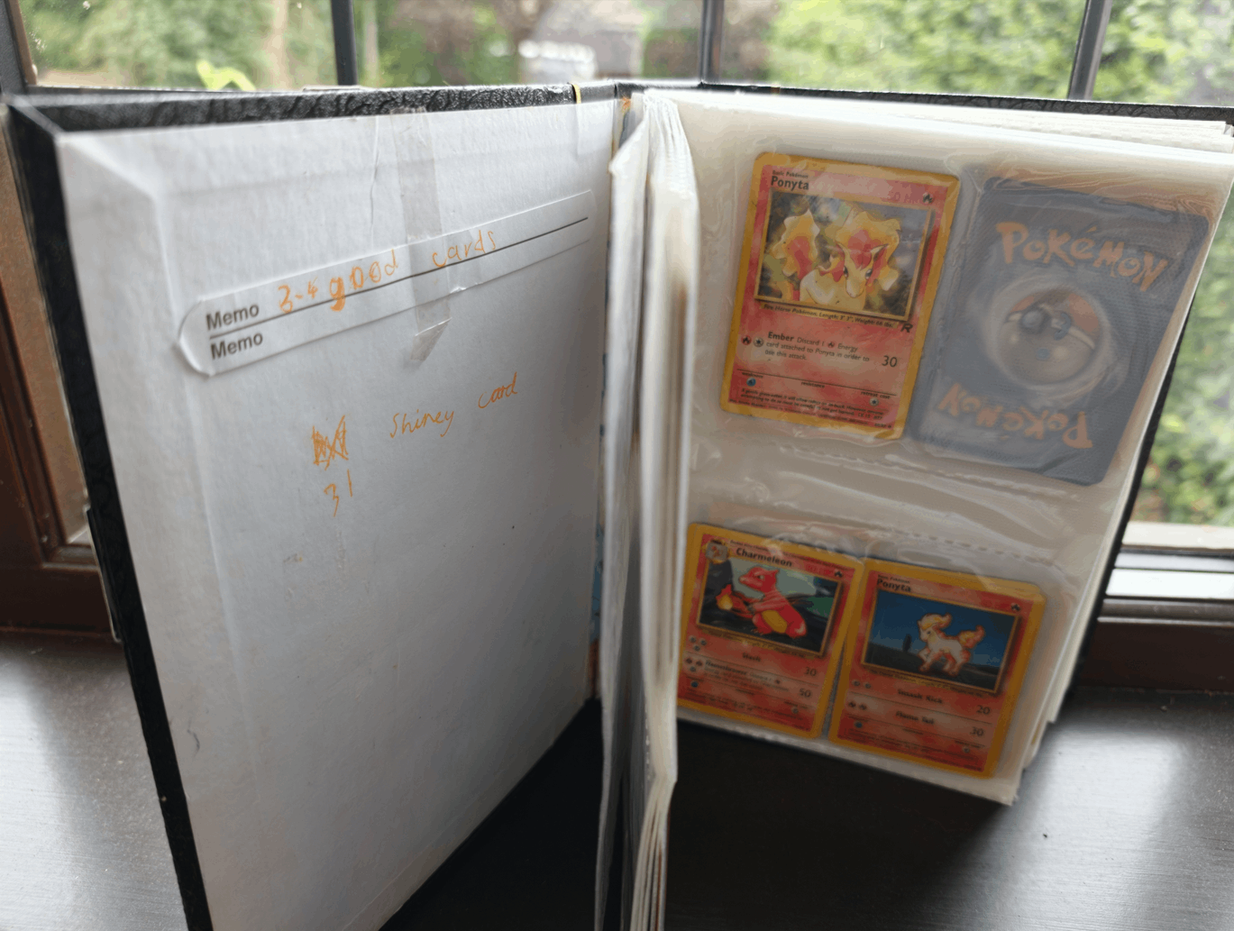 A binder full of cards found in our attic